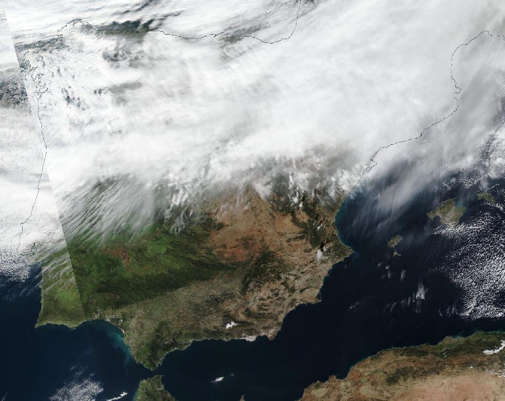 True-colour satellite image of the Iberian Peninsula and the Balearic Islands on 27 December 2020
