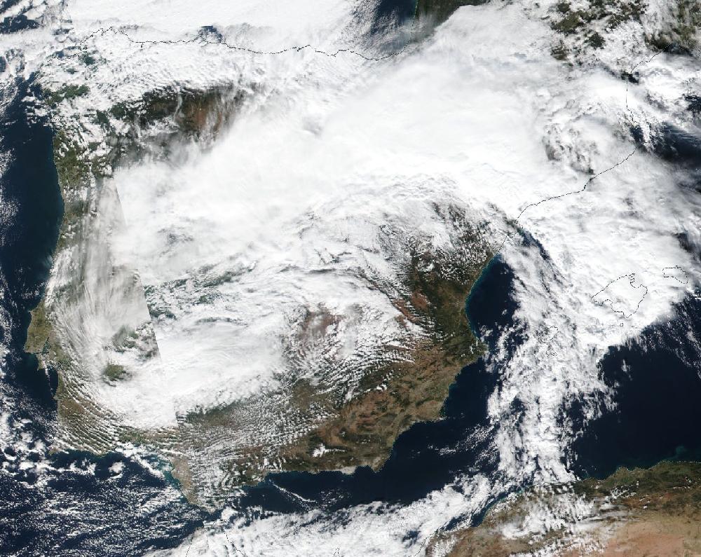 True-colour satellite image of the Iberian Peninsula and the Balearic Islands on 23 November 2021