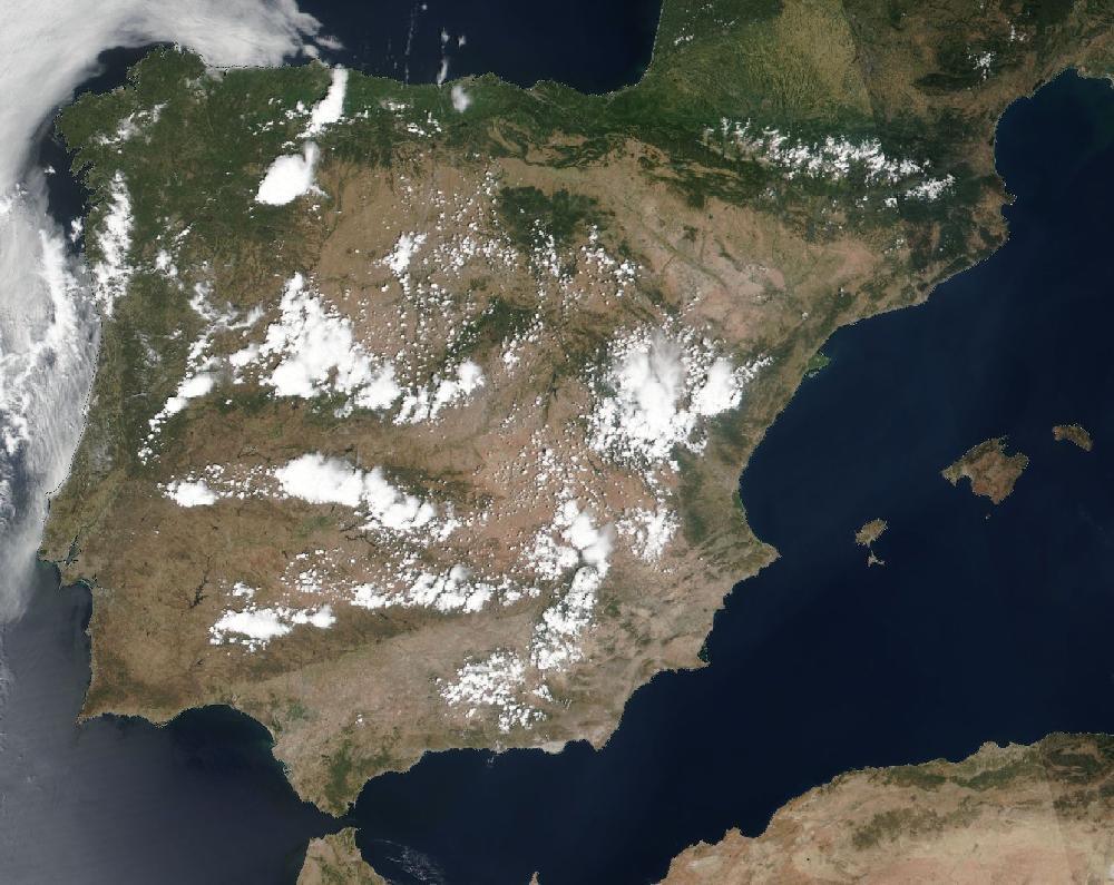 True-colour satellite image of the Iberian Peninsula and the Balearic Islands on 29 June 2025