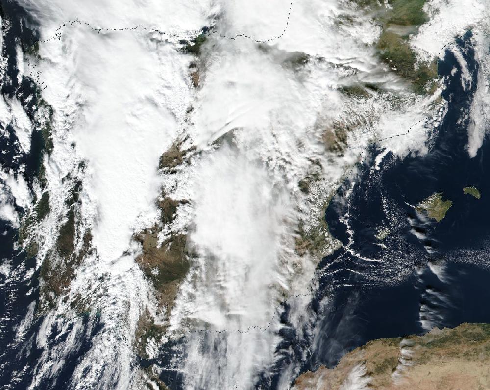 True-colour satellite image of the Iberian Peninsula and the Balearic Islands on 5 November 2025