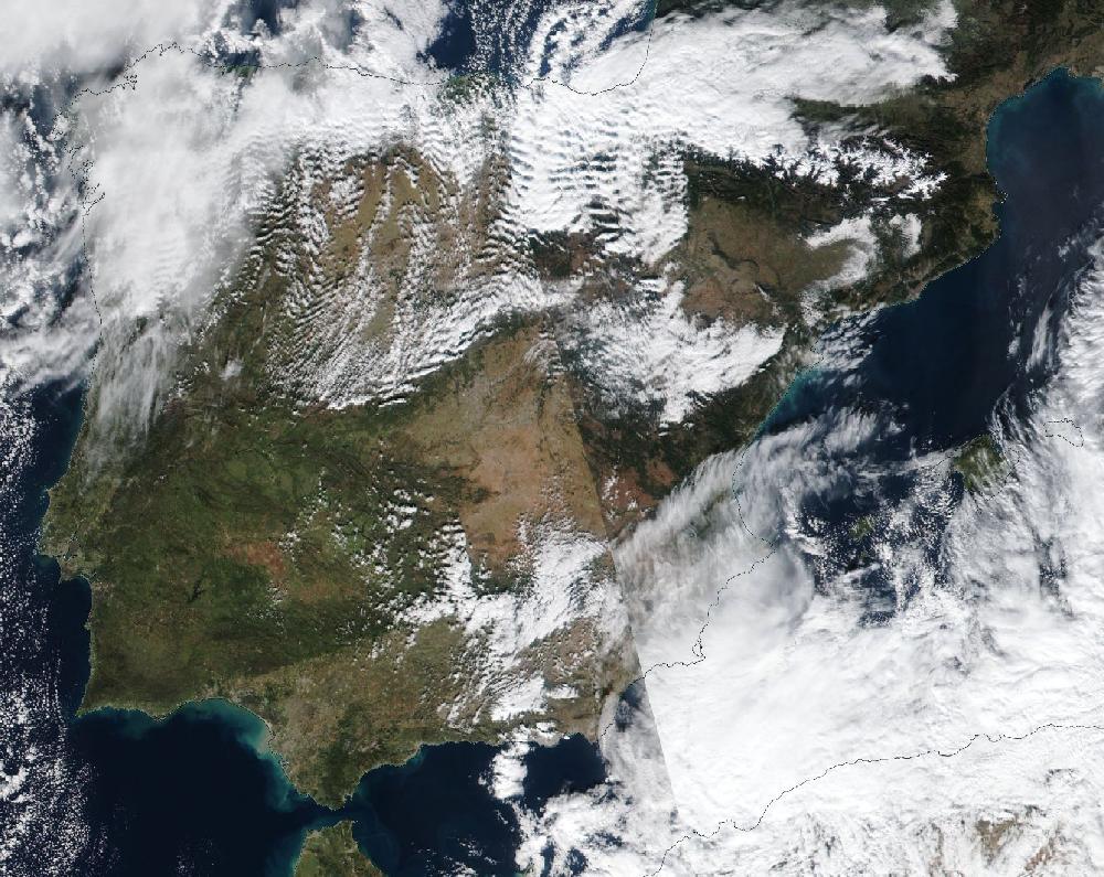 True-colour satellite image of the Iberian Peninsula and the Balearic Islands on 6 January 2026