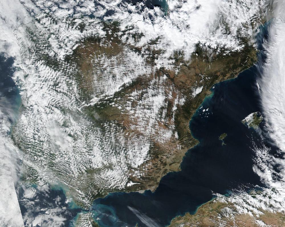 True-colour satellite image of the Iberian Peninsula and the Balearic Islands on 31 January 2026