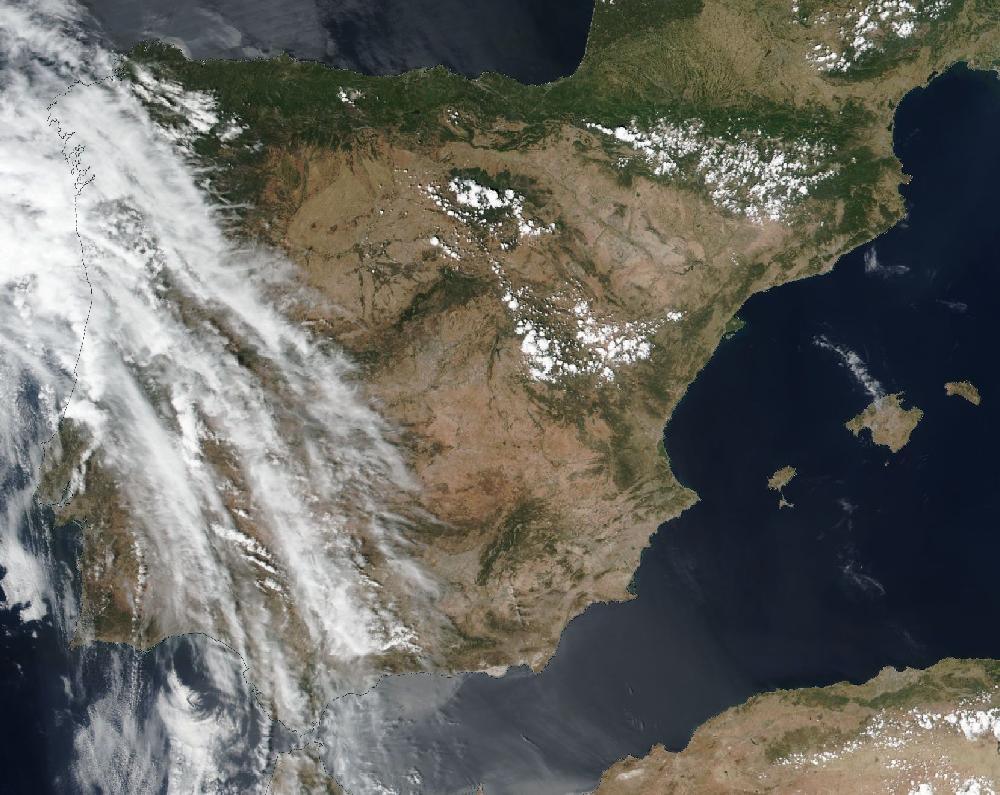 True-colour satellite image of the Iberian Peninsula and the Balearic Islands on 23 June 2026